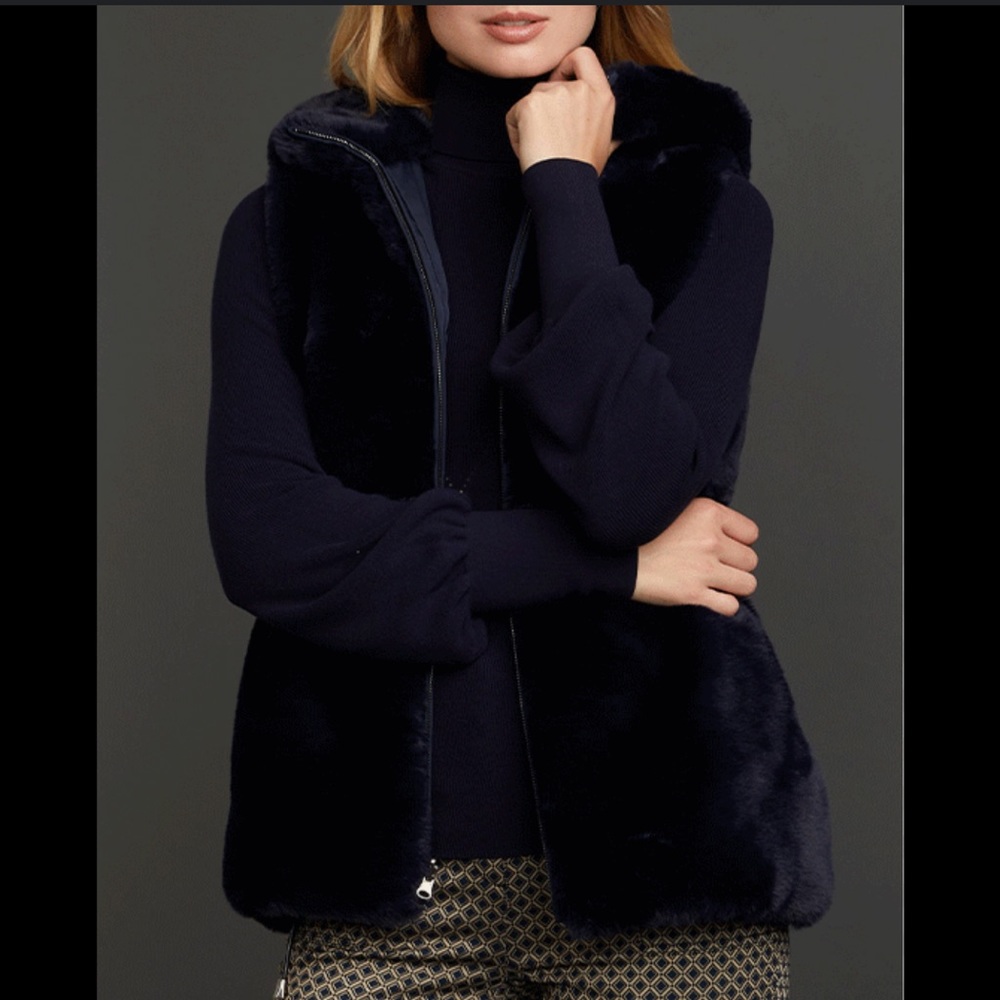 Beautiful winter hooded vest. Faux Otter fur luxurious feel.  NEVER BEEN WORN.